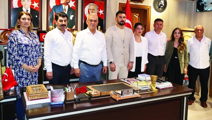 MHP Adana İl Başkanı Yusuf Kanlı ve MYK Üyesi Mustafa İzgioğlu, MHP Çukurova İlçe Teşkilatının düzenlediği aşure etkinliğine katıldılar.